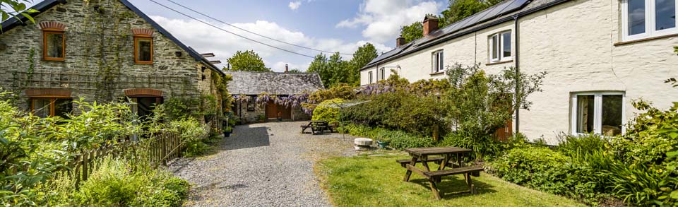 Charming holiday cottages with log fires and private enclosed gardens