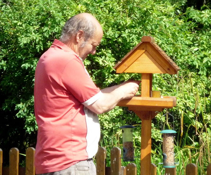 John feeding the birds at Exmoor Cottage Holidays in Exmoor, North Devon